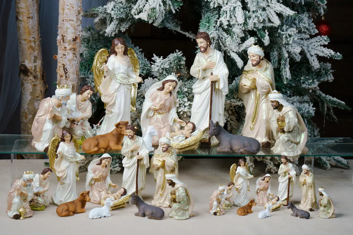 Eleven Piece Blush Pink and Ivory Nativity Set with a Gloria Banner Angel and a Pearlized Finish in Three Sizes
