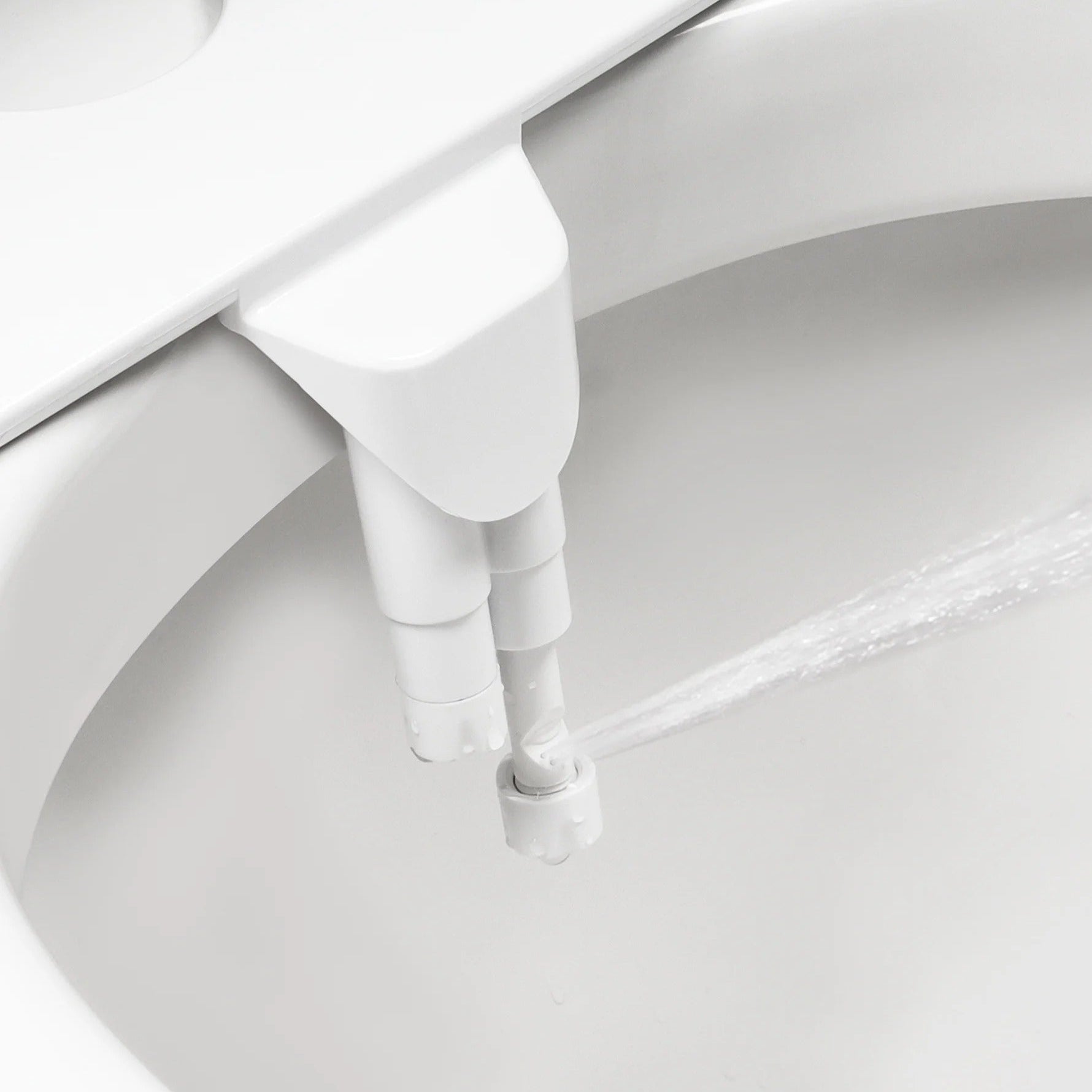 Dual Nozzle Bidet Attachment with Adjustable Pressure and Self-Cleaning System