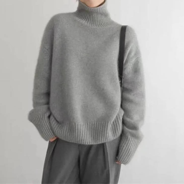 Loose Fit Turtleneck Sweater with Full Length Sleeves and Stretch Knit