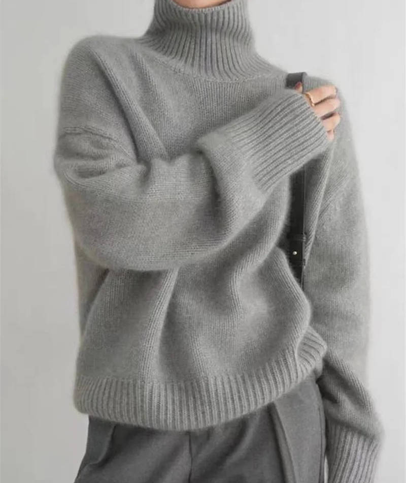Loose Fit Turtleneck Sweater with Full Length Sleeves and Stretch Knit