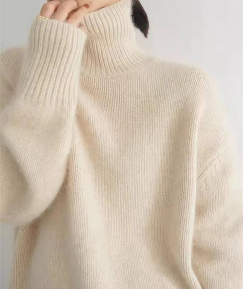 Loose Fit Turtleneck Sweater with Full Length Sleeves and Stretch Knit