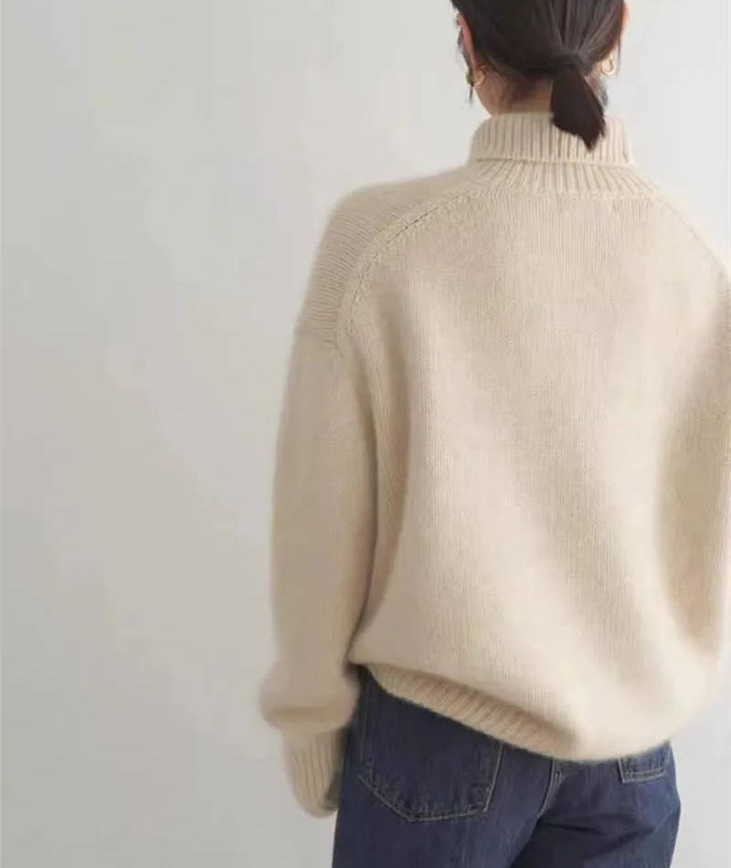 Loose Fit Turtleneck Sweater with Full Length Sleeves and Stretch Knit