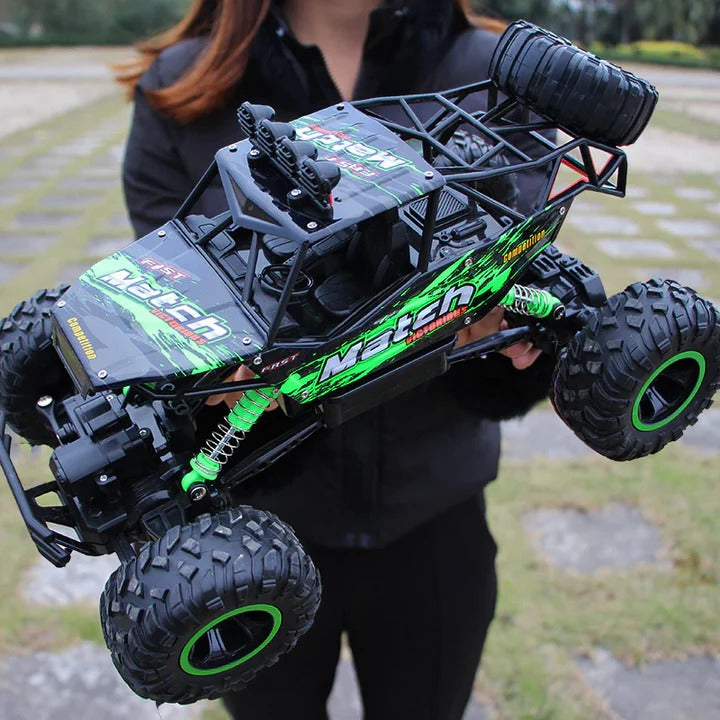 Rechargeable 1:12 Scale 4WD Remote Control Monster Truck with Two Battery Packs and a 2.4GHz Controller