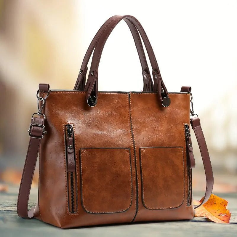 Zippered Handbag with Multiple Compartments and Adjustable Shoulder Strap
