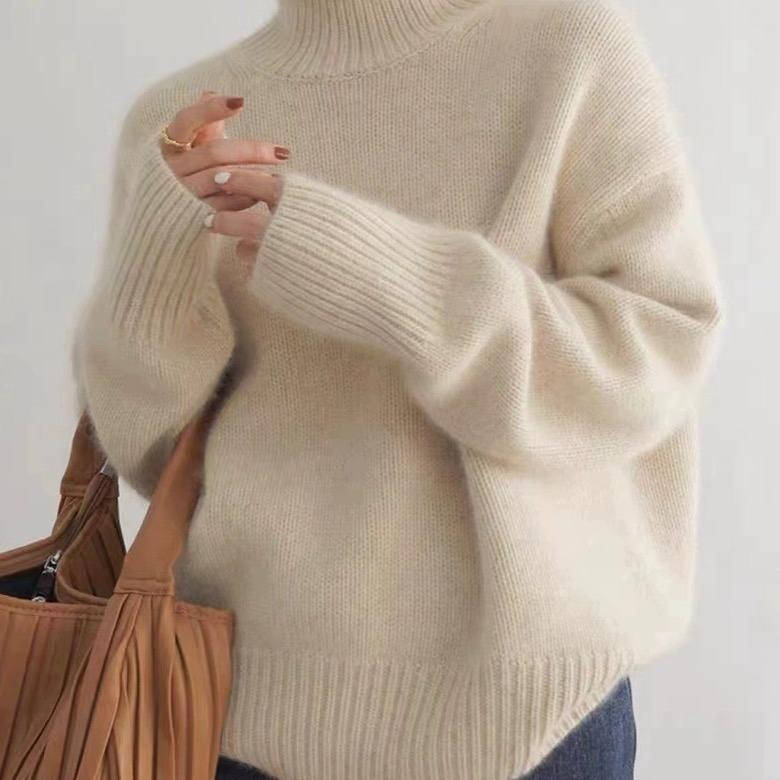 Loose Fit Turtleneck Sweater with Full Length Sleeves and Stretch Knit