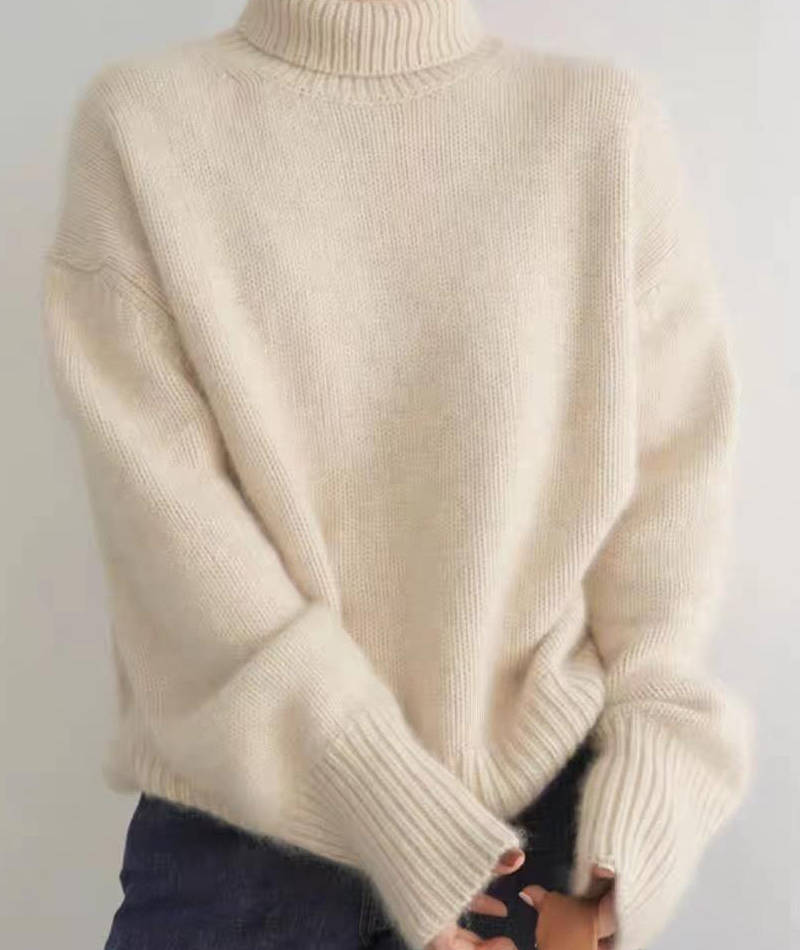 Loose Fit Turtleneck Sweater with Full Length Sleeves and Stretch Knit
