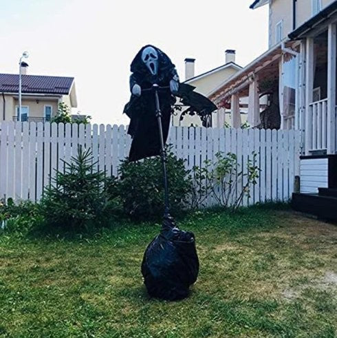 Wind-Activated Scarecrow with Screaming Ghost Mask and Skeletal Hands for Halloween Yard Display