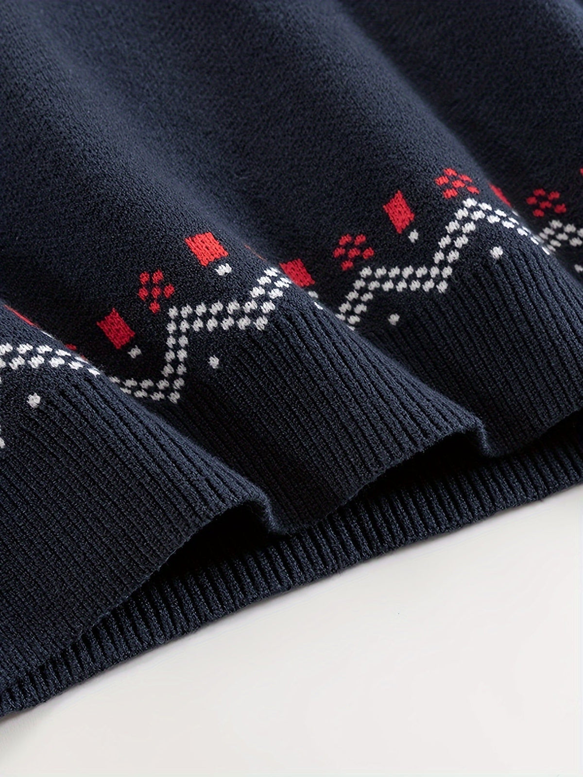 Mens Nordic Snowflake Knit Sweater with Ribbed Cuffs and Hem and a Round Neck in Navy