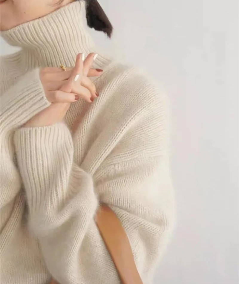 Loose Fit Turtleneck Sweater with Full Length Sleeves and Stretch Knit