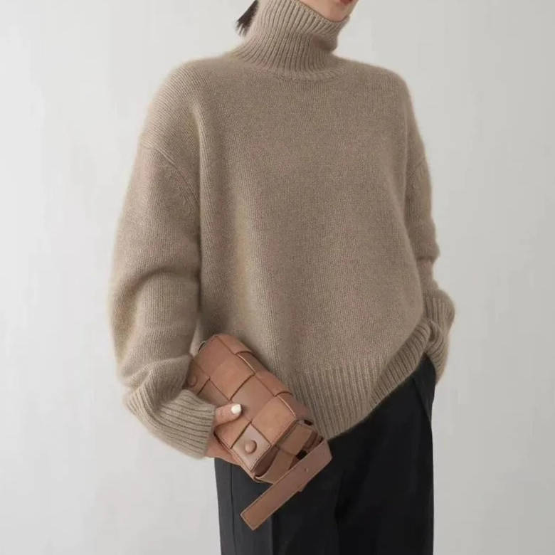 Loose Fit Turtleneck Sweater with Full Length Sleeves and Stretch Knit