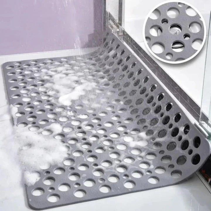 Suction Cup Shower Mat with a Textured Surface and Water Drainage in Seven Colors