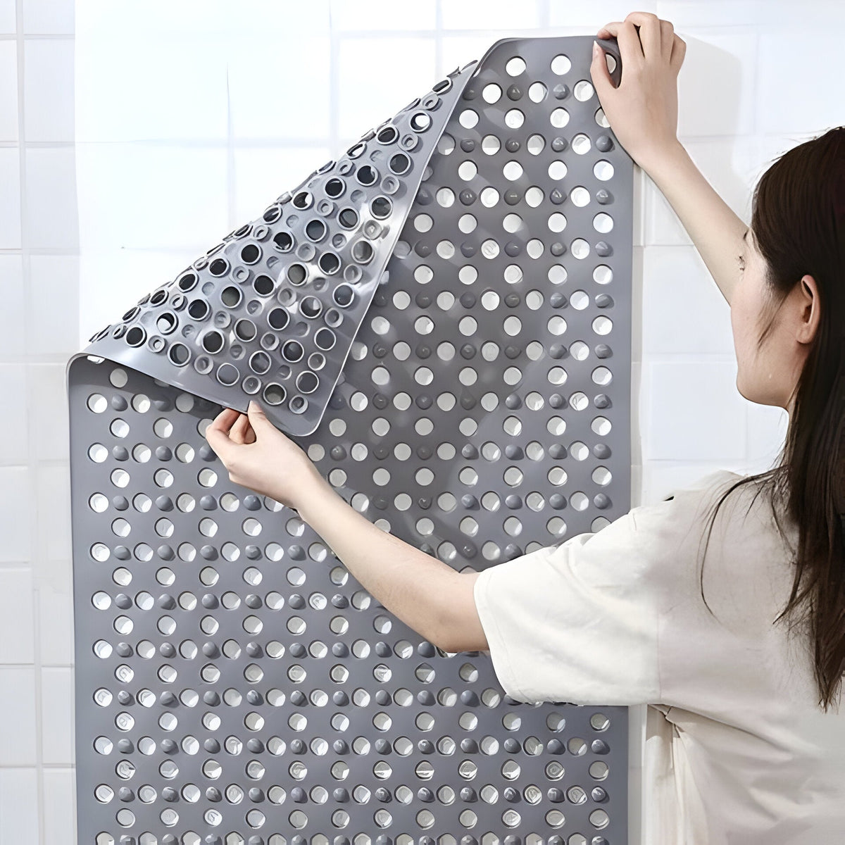 Suction Cup Shower Mat with a Textured Surface and Water Drainage in Seven Colors