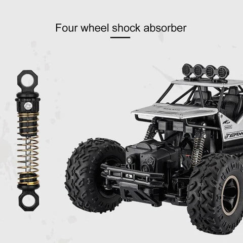 Rechargeable 1:12 Scale 4WD Remote Control Monster Truck with Two Battery Packs and a 2.4GHz Controller