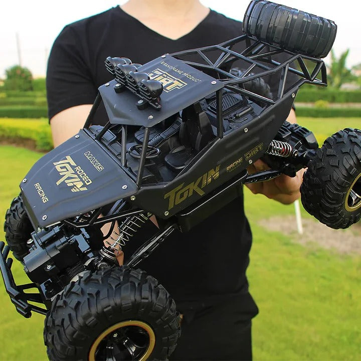 Rechargeable 1:12 Scale 4WD Remote Control Monster Truck with Two Battery Packs and a 2.4GHz Controller