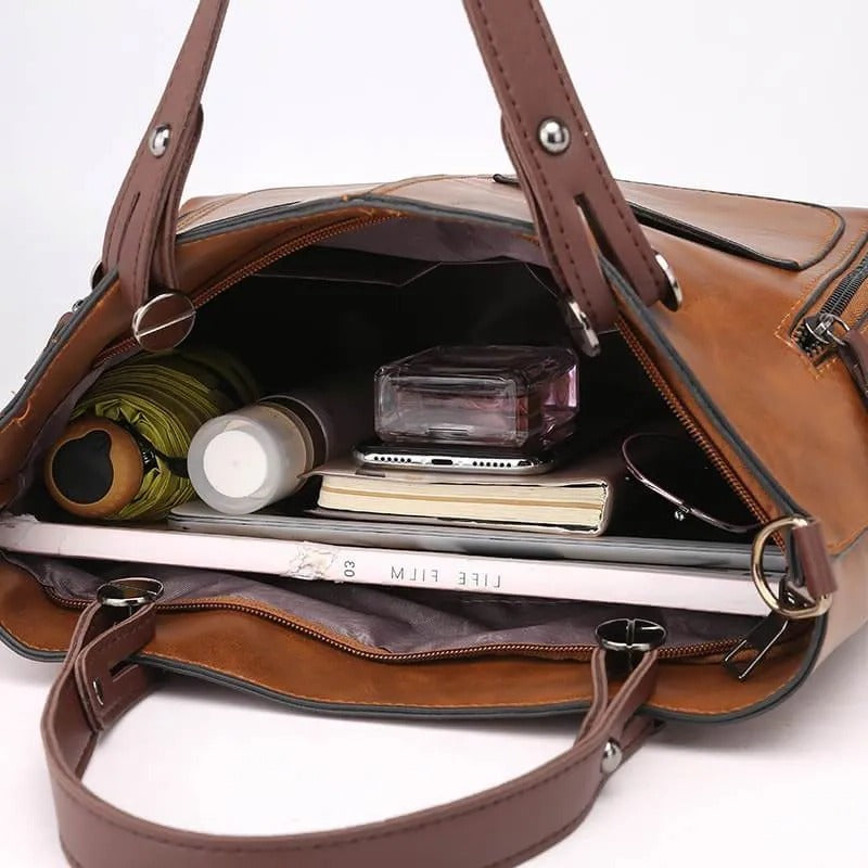 Zippered Handbag with Multiple Compartments and Adjustable Shoulder Strap
