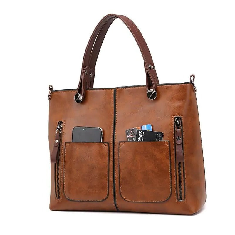 Zippered Handbag with Multiple Compartments and Adjustable Shoulder Strap