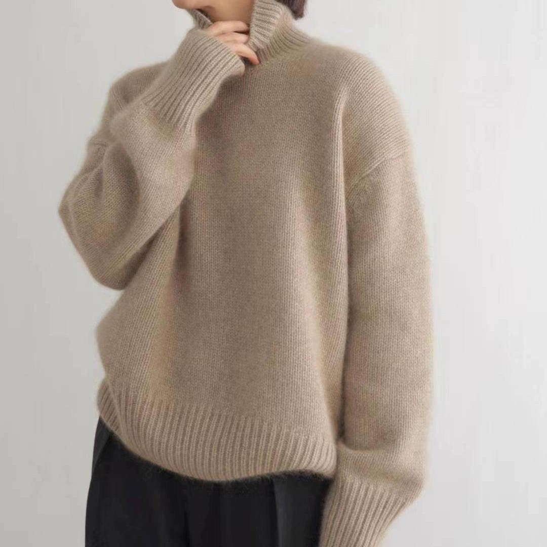 Loose Fit Turtleneck Sweater with Full Length Sleeves and Stretch Knit