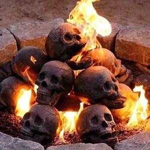 Ceramic Skull Fire Pit Log with Hollow Eye Openings for Halloween Displays